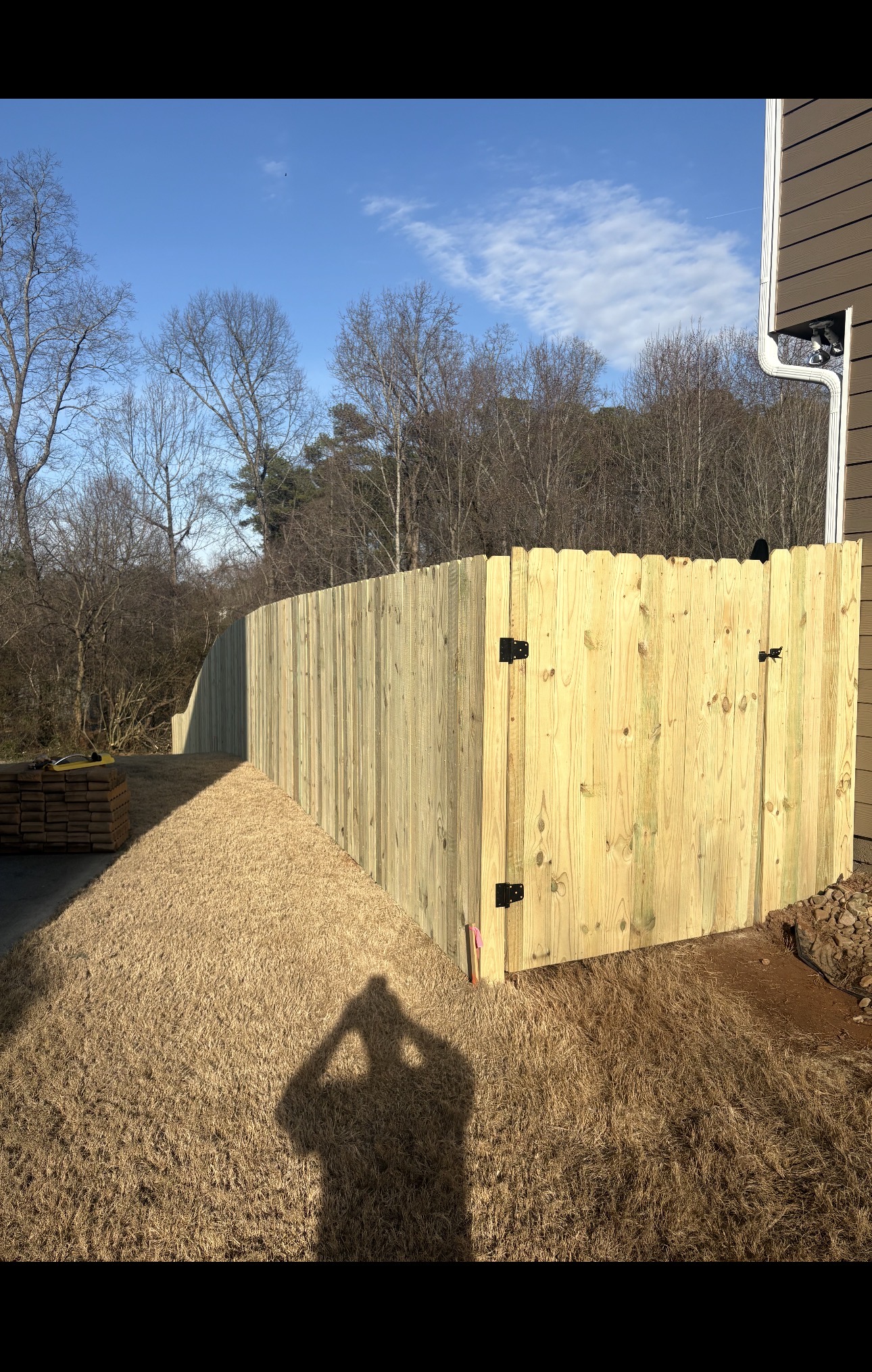 Glossy finished deck after staining — long plank view